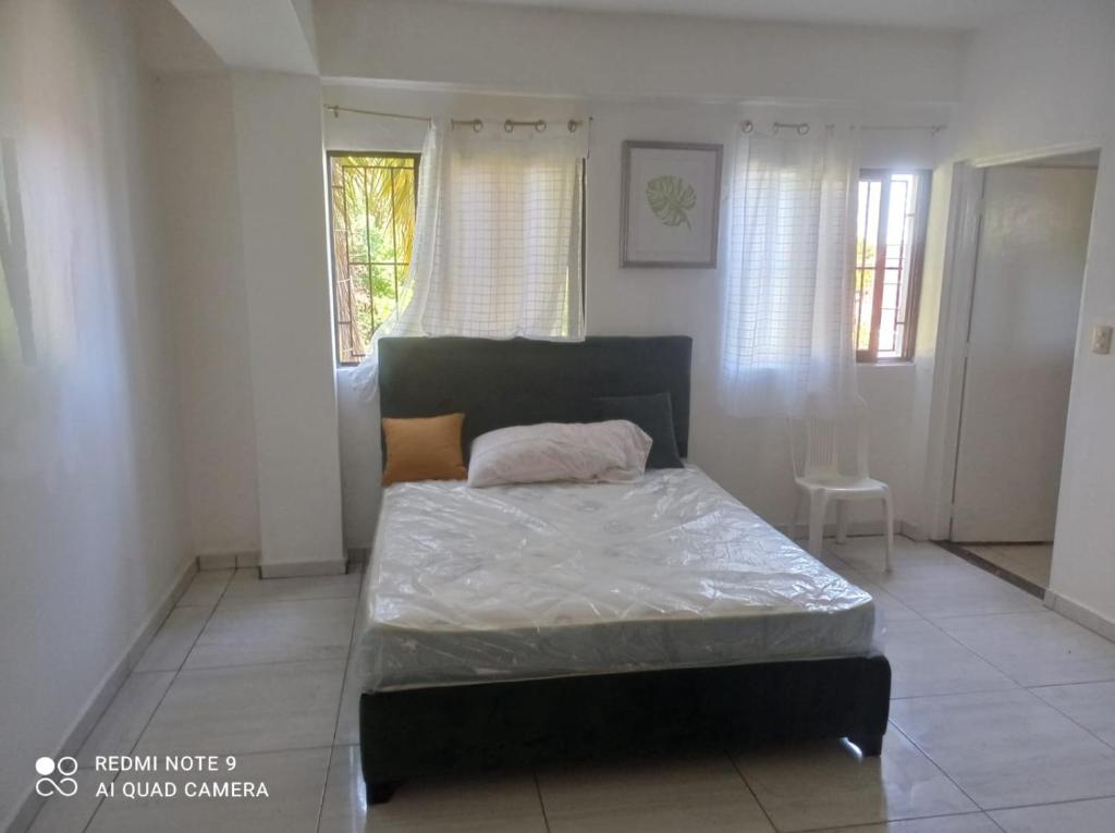 Postel nebo postele na pokoji v ubytování M & N Hostal