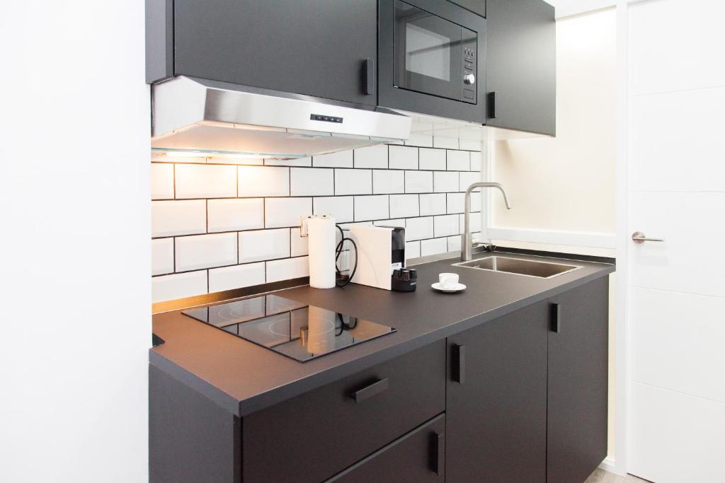 Køkken eller tekøkken på GoToSeville Mini Studio