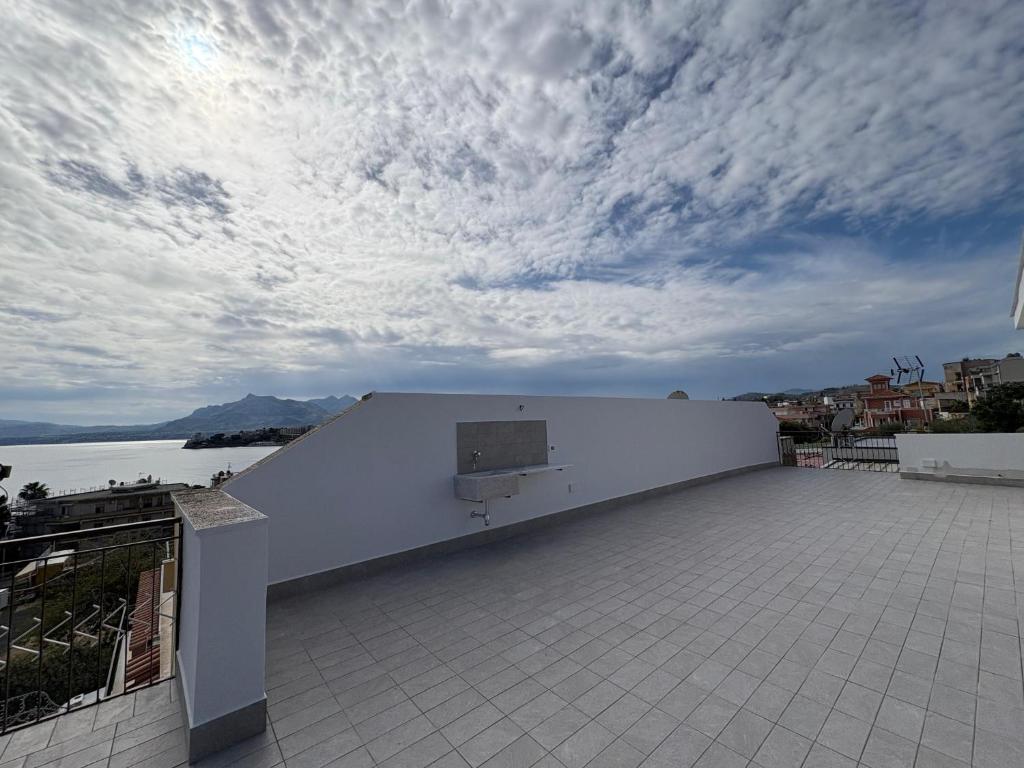 a building with a basketball court on the roof at La Nassa e il Faro in Porticello