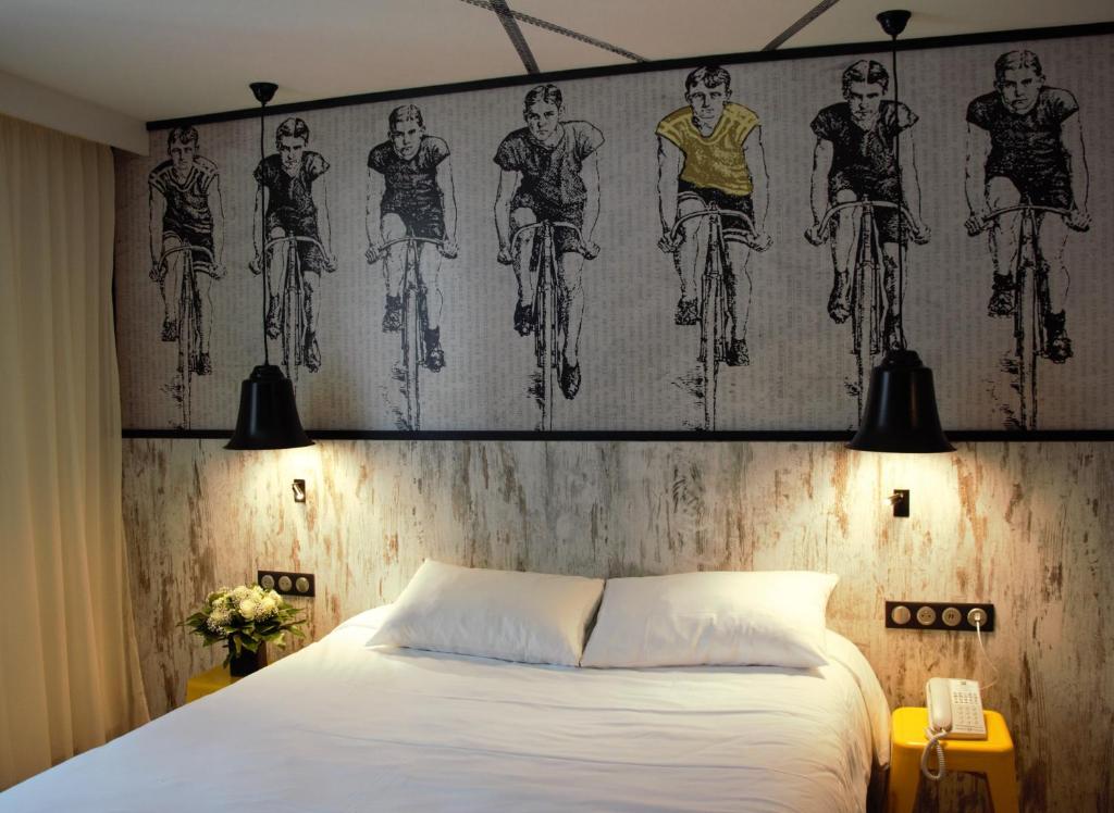 Postel nebo postele na pokoji v ubytování ibis Styles Dinan Centre Ville