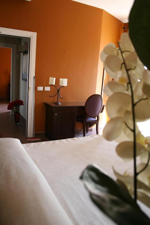 Postel nebo postele na pokoji v ubytování Hotel dei Coloniali