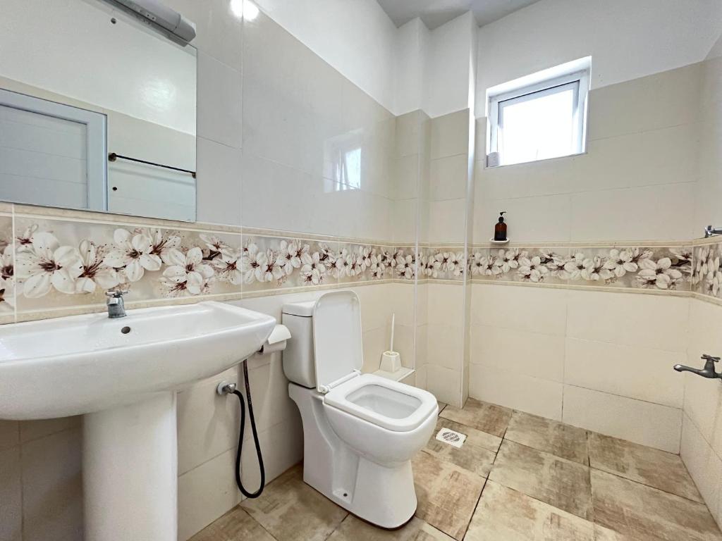 Ένα μπάνιο στο Jahari Luxury Apartments