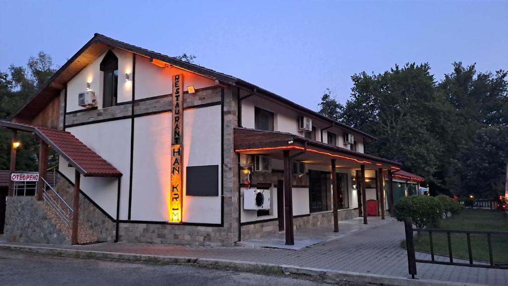 a building on the side of a street at Restaurant-Motel Khan Krum in Kamchiya