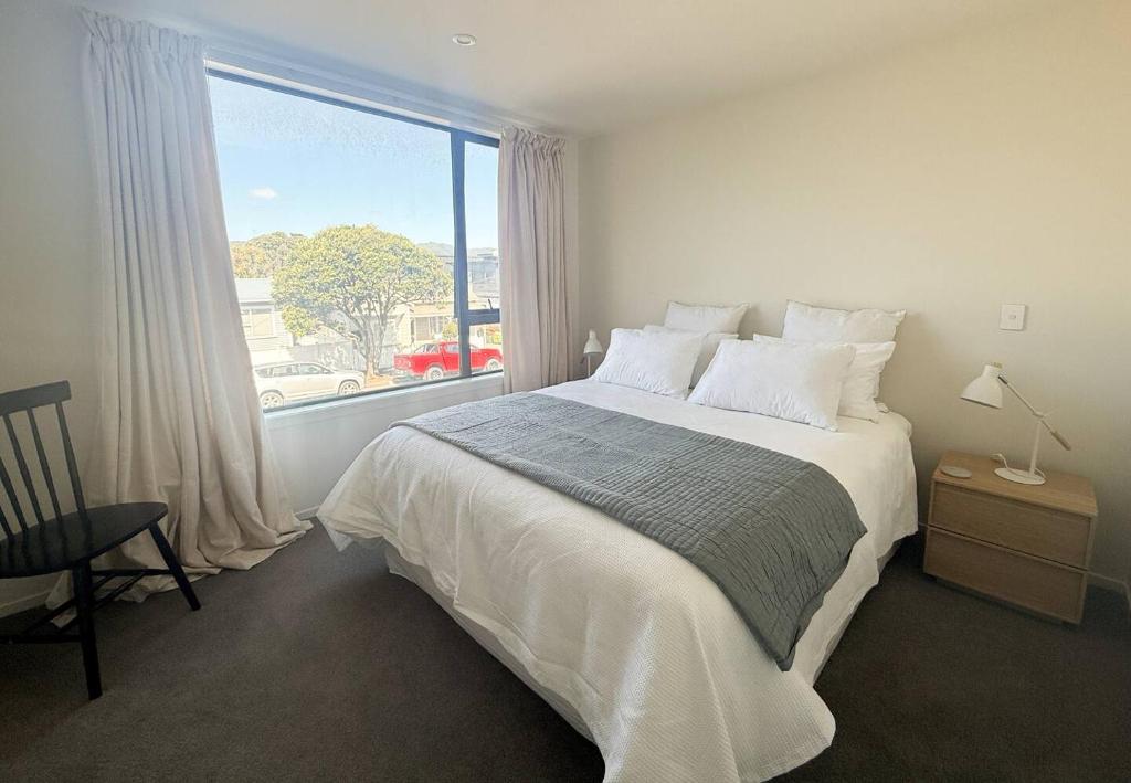 Katil atau katil-katil dalam bilik di The Petone Beauty - Flash, Beachside