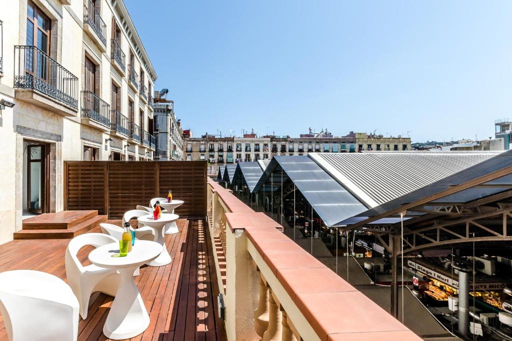 Reštaurácia alebo iné gastronomické zariadenie v ubytovaní Exe Ramblas Boquería