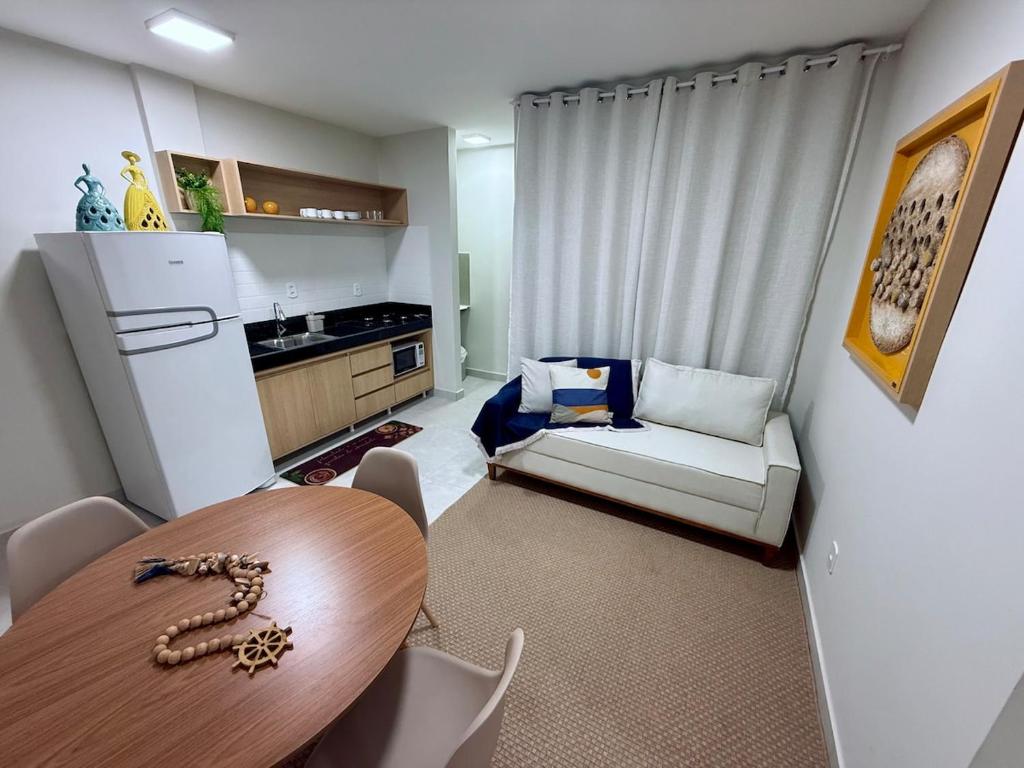 Η κουζίνα ή μικρή κουζίνα στο Flat Mucuri - Praia centro