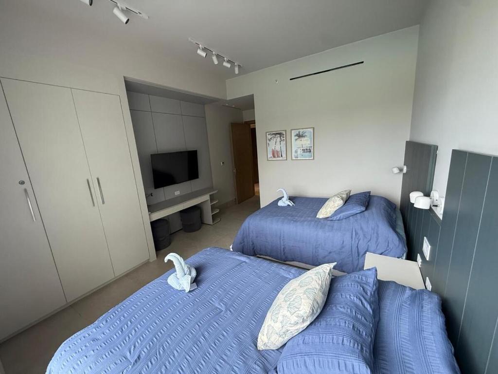 Postel nebo postele na pokoji v ubytování Playa Escondida Luxurious Ground Floor