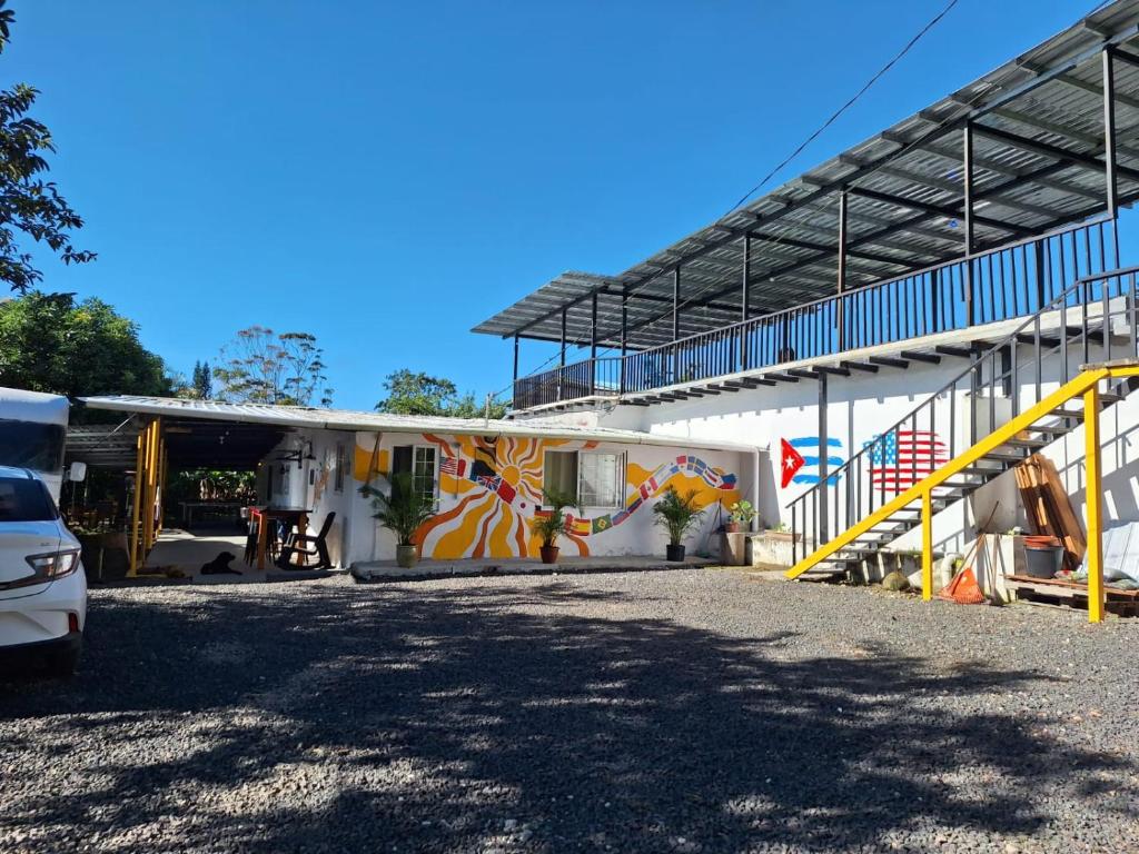 a building with a mural on the side of it at MejorClub in Valle de Anton