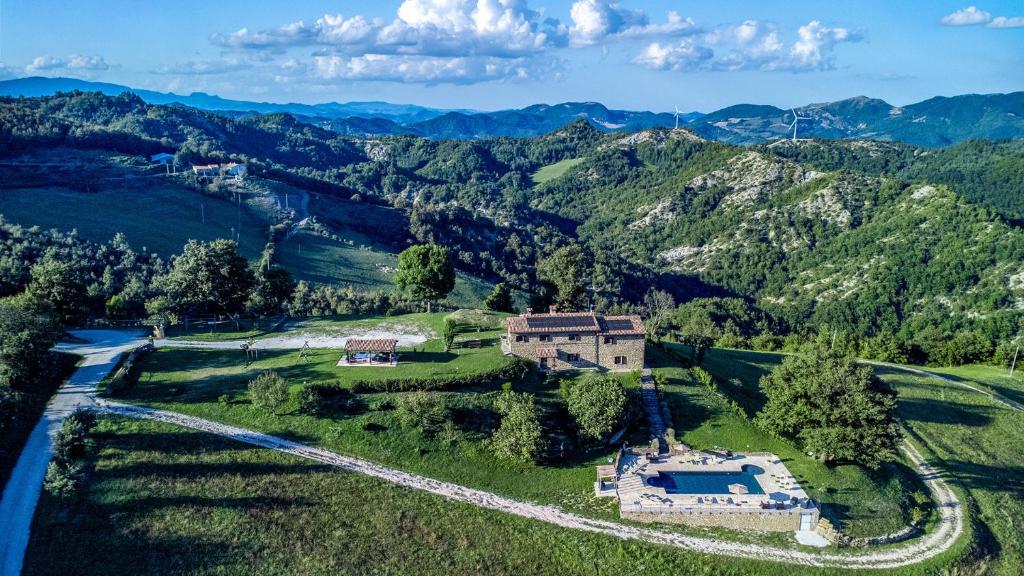 an aerial view of a house in the mountains at Ca Quattrocchi 10&3 by Marche Holiday Villas in Apecchio