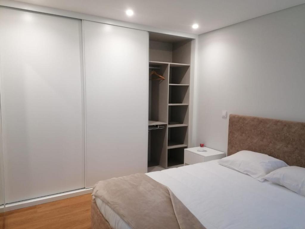 Postel nebo postele na pokoji v ubytování Casa Gonzaga