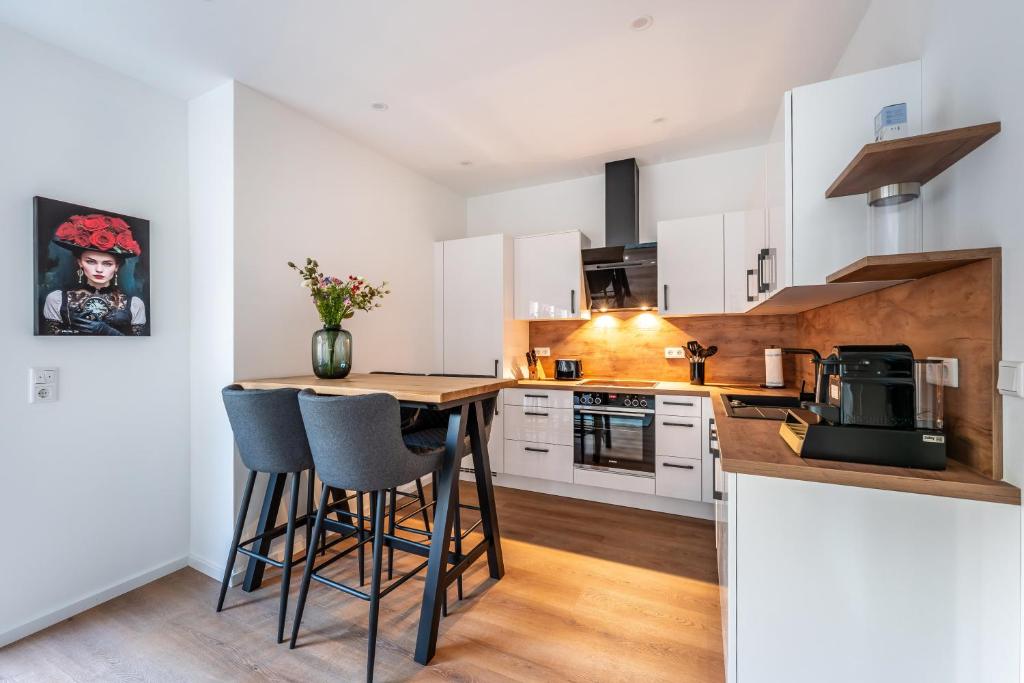 Kuchyň nebo kuchyňský kout v ubytování Kathihomes Zentral