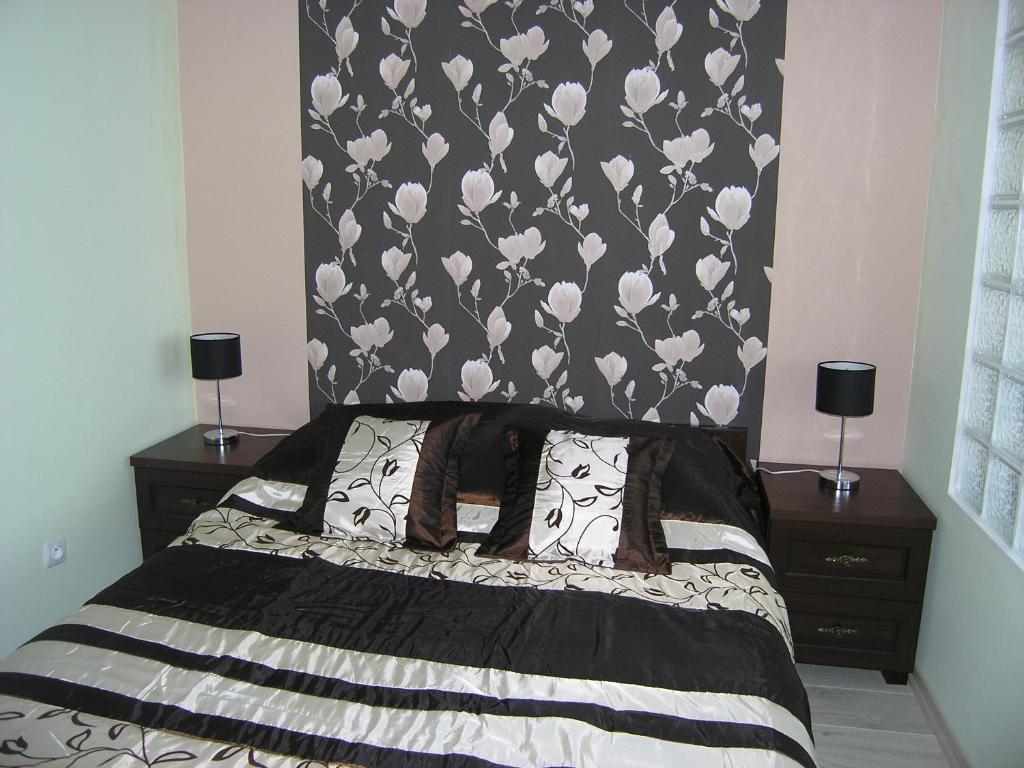 
Łóżko lub łóżka w pokoju w obiekcie Apartament Zielony Kolobrzeg
