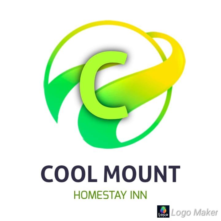 a green c logo with acgi mountain in a circle at Cool mount inn in Haputale