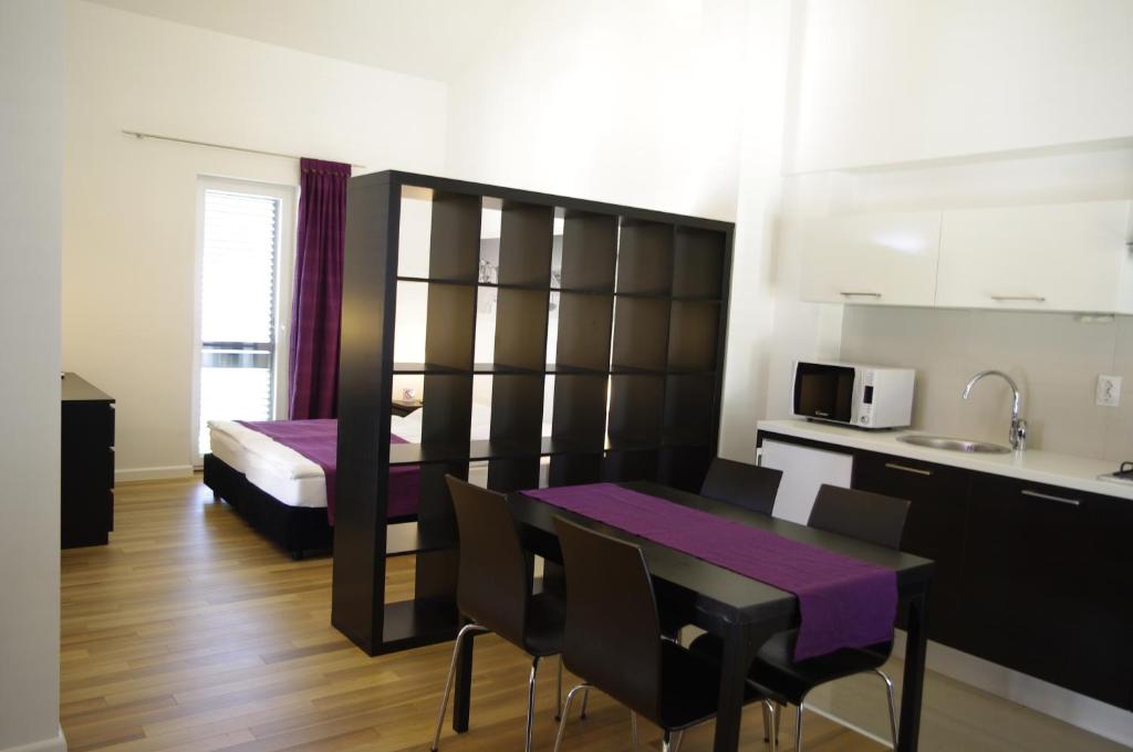 Kuchyň nebo kuchyňský kout v ubytování Apartments Santis10
