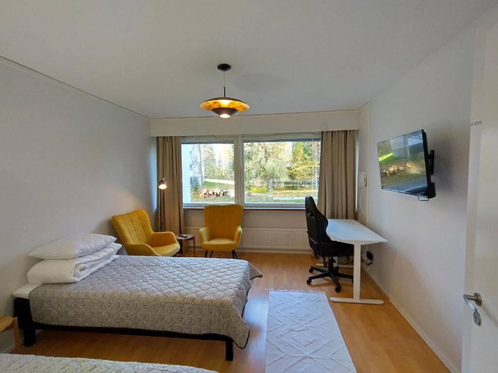 Postel nebo postele na pokoji v ubytování Asuntos-3