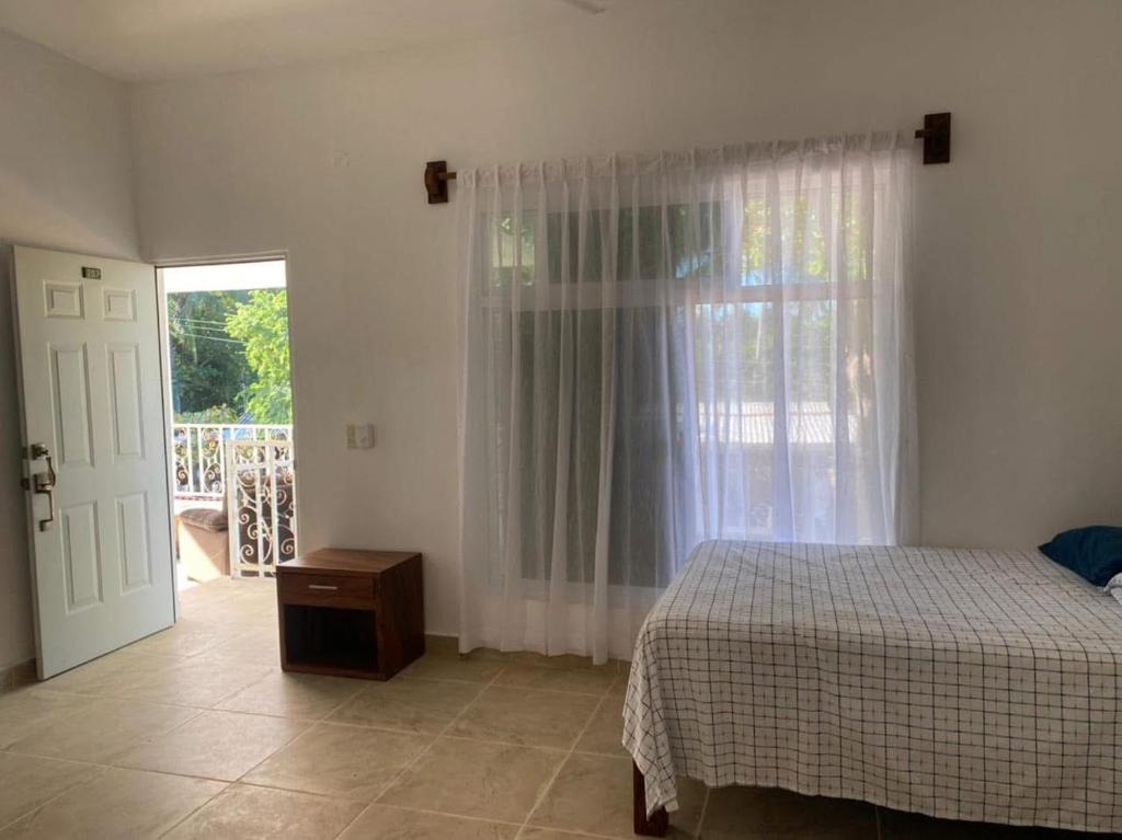 Ένα ή περισσότερα κρεβάτια σε δωμάτιο στο Hotel Bambu