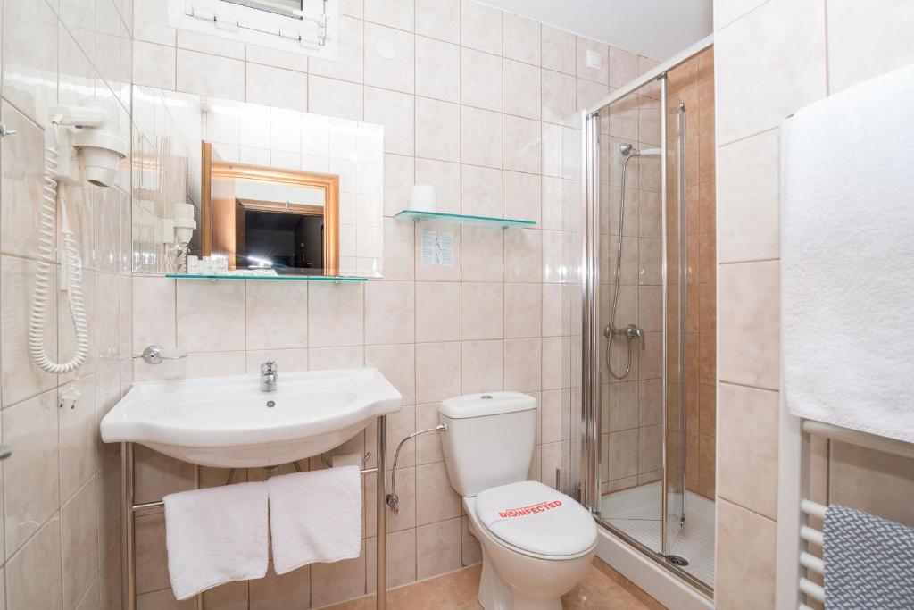 Koupelna v ubytování Hotel Europe
