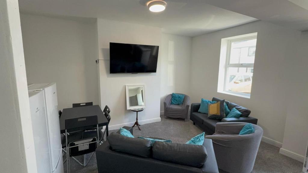 TV a/nebo společenská místnost v ubytování Carlisle October