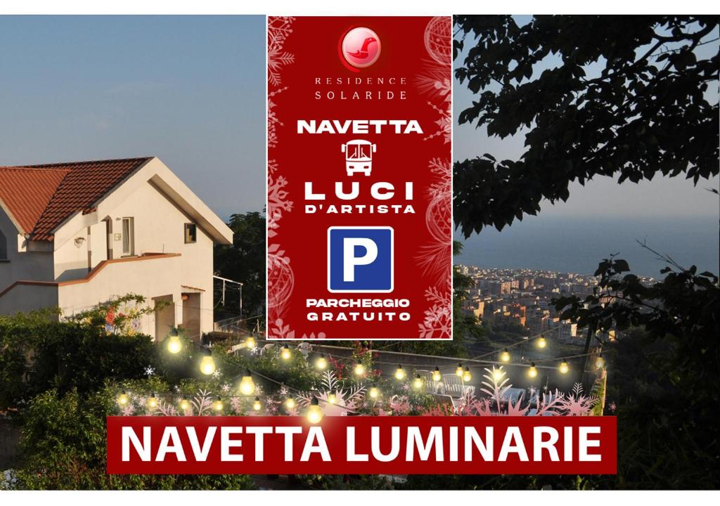 a sign for a restaurant with a building in the background at RESIDENCE SOLARIDE apartments, FREE PRIVATE PARKING WITH VIDEOSURVELLIANCE and SHUTTLE SERVICE in Salerno
