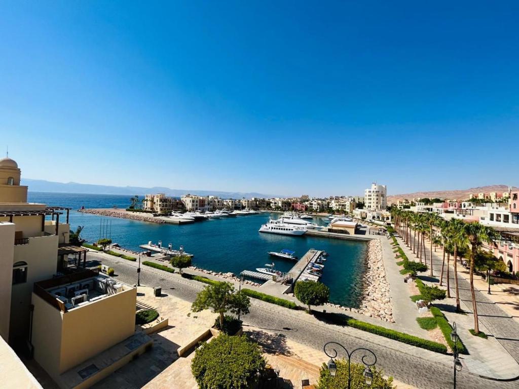 a view of a harbor with boats in the water at منتجع تالابيه العقبة in Aqaba