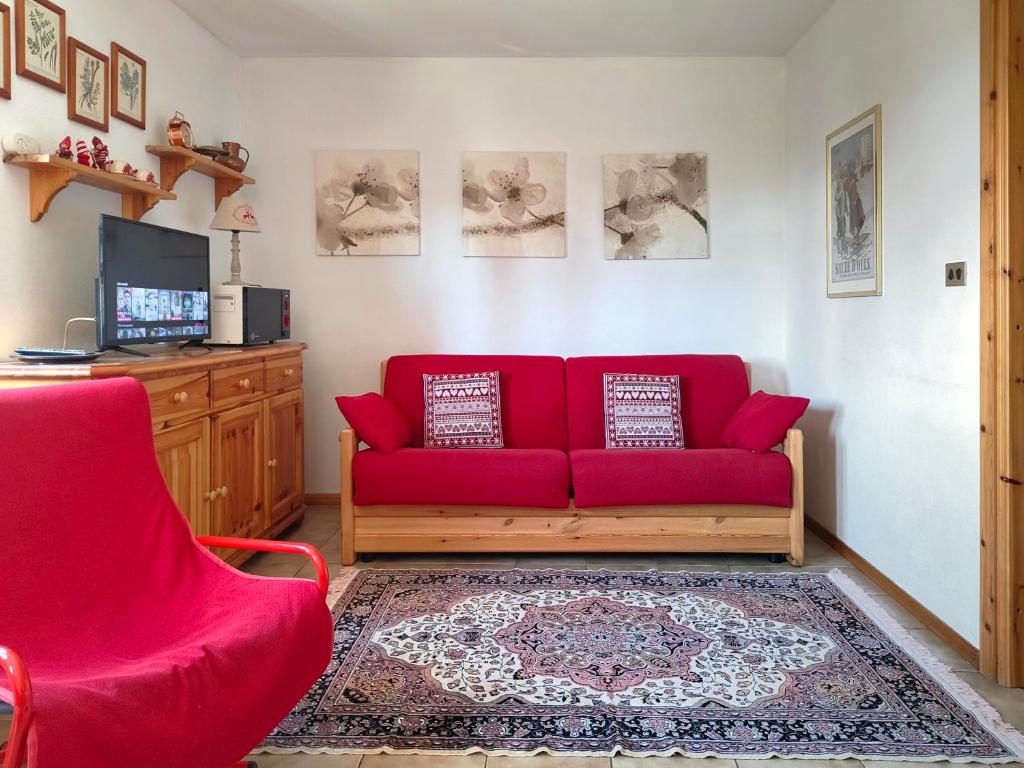 Μια τηλεόραση ή/και κέντρο ψυχαγωγίας στο Chambre d'Or View Apartment