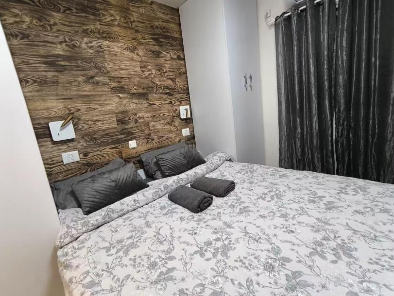 Ένα ή περισσότερα κρεβάτια σε δωμάτιο στο Kasa R