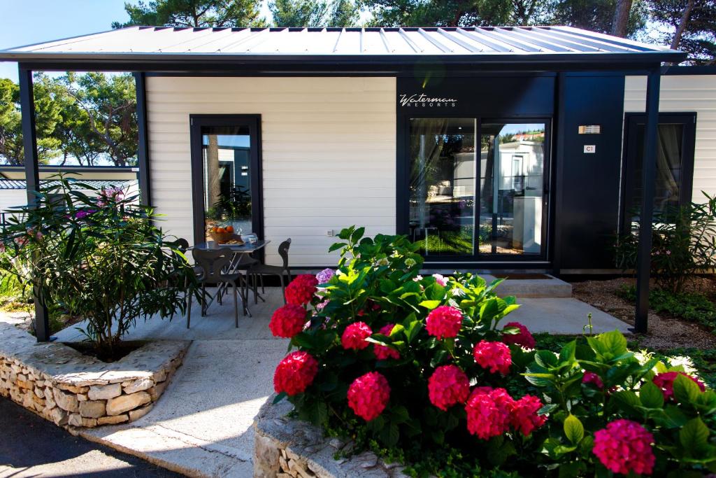Um jardim em Waterman Beach Village