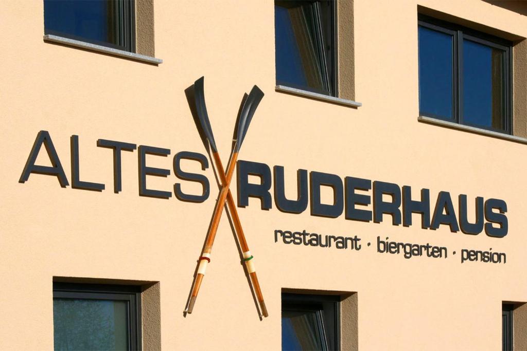 a large clock on the side of a building at Altes Ruderhaus in Worms