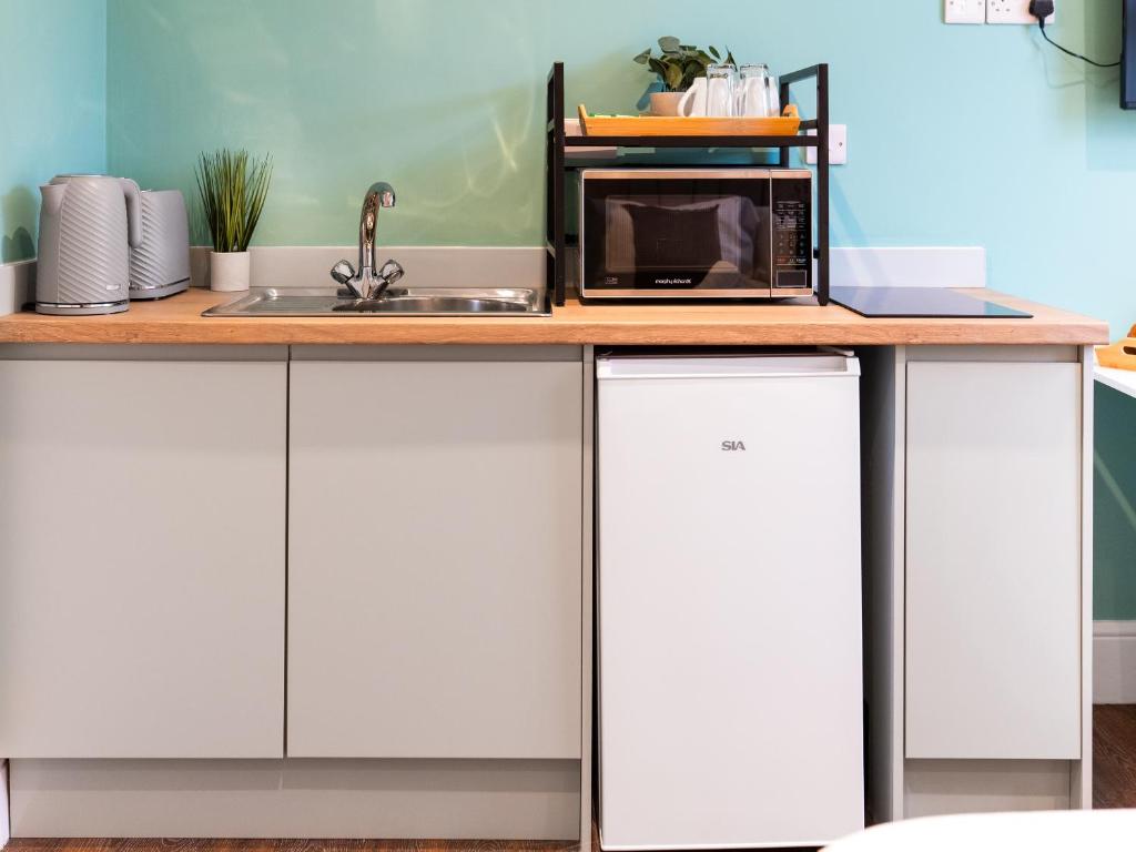 Kuchyň nebo kuchyňský kout v ubytování Hilltop Apartment 7 - Uk50599