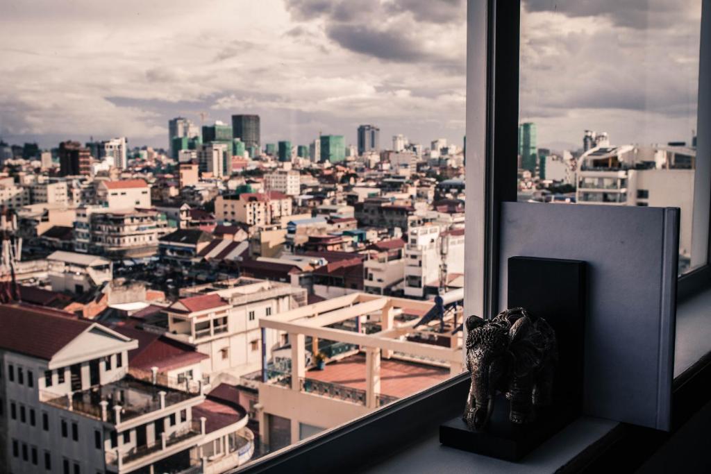 Nespecifikovaný výhled na destinaci Phnompenh nebo výhled na město při pohledu z hotelu