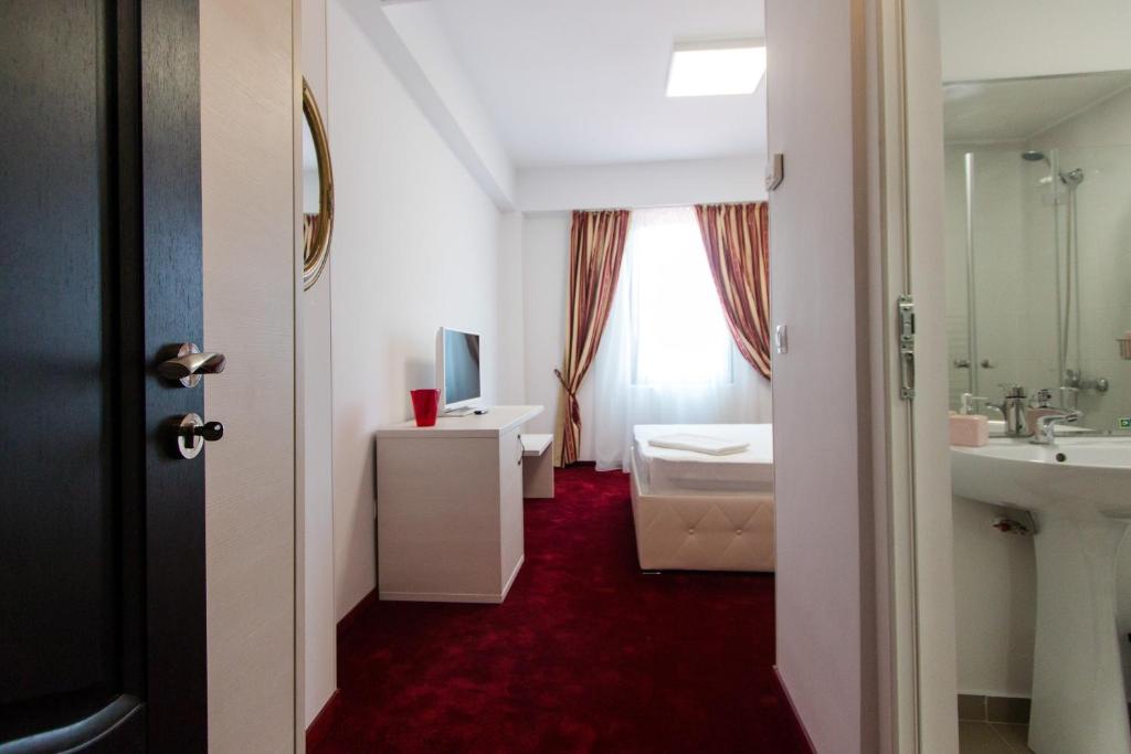 Koupelna v ubytování Hotel Evianne Boutique