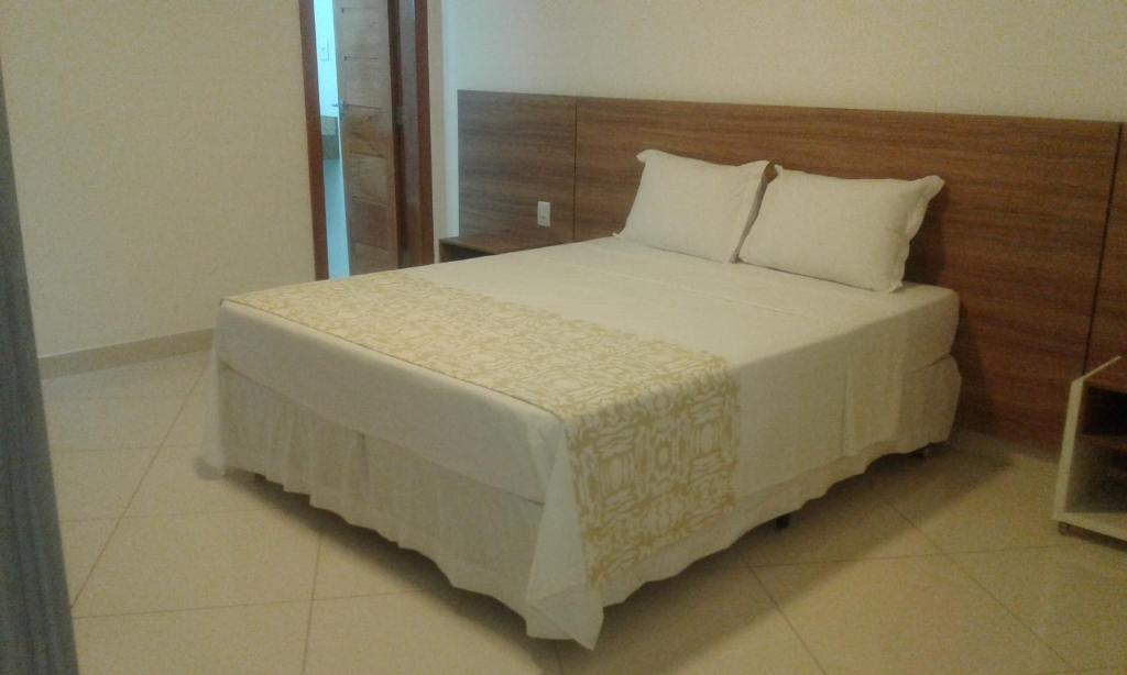 Postel nebo postele na pokoji v ubytování Granterrara Hotel