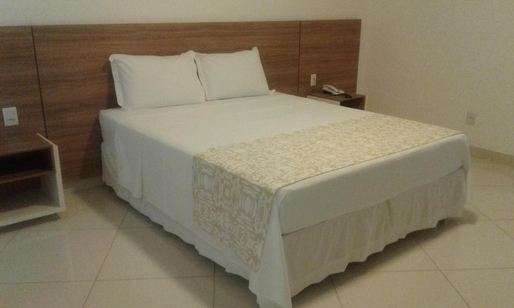 Postel nebo postele na pokoji v ubytování Granterrara Hotel
