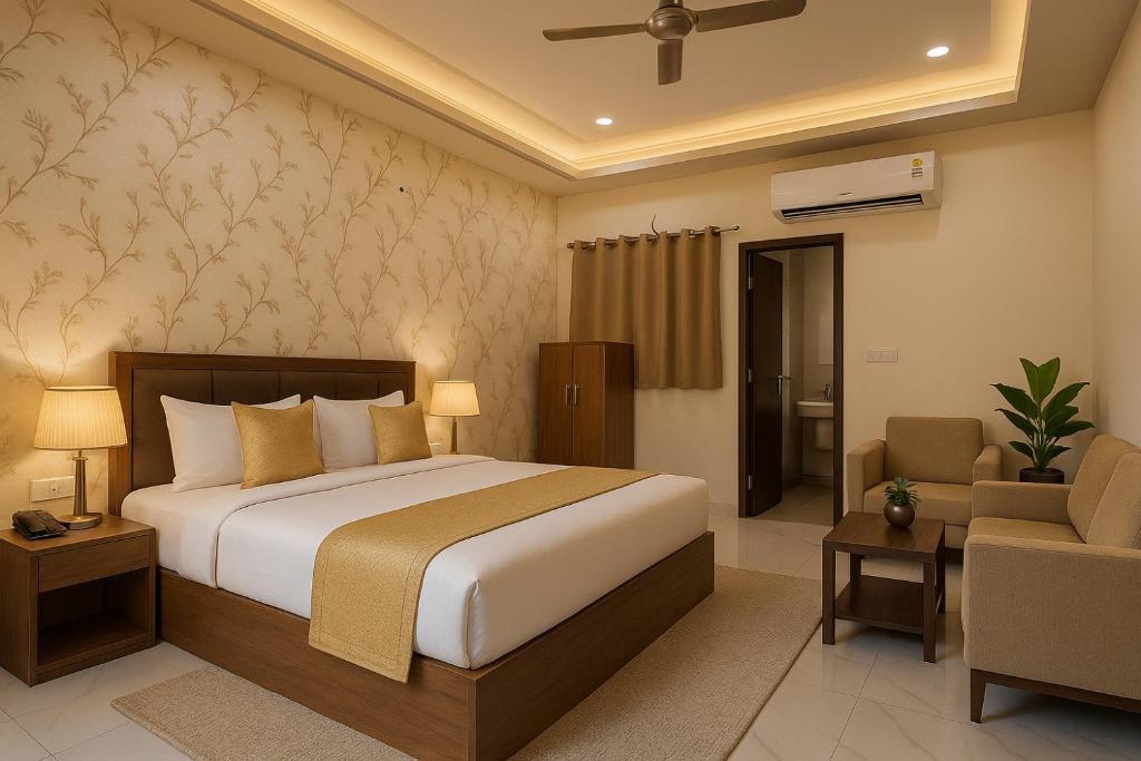 a hotel room with a bed and a chair at Hotel Vrindavan Palace - A Luxury Stay with Parking near Prem Mandir City Center # By Om# in Vrindāvan