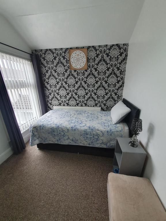 Ένα ή περισσότερα κρεβάτια σε δωμάτιο στο Private Room In Cardiff