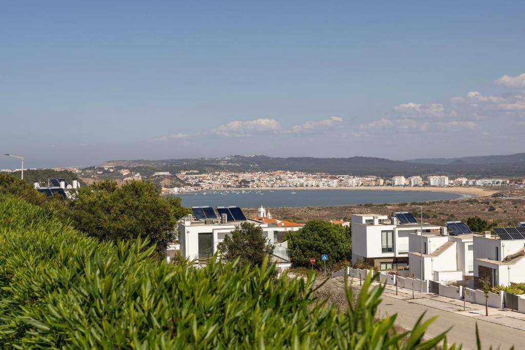 a view of a city and a body of water at Atlantic Panoramic Villa in Salir de Porto
