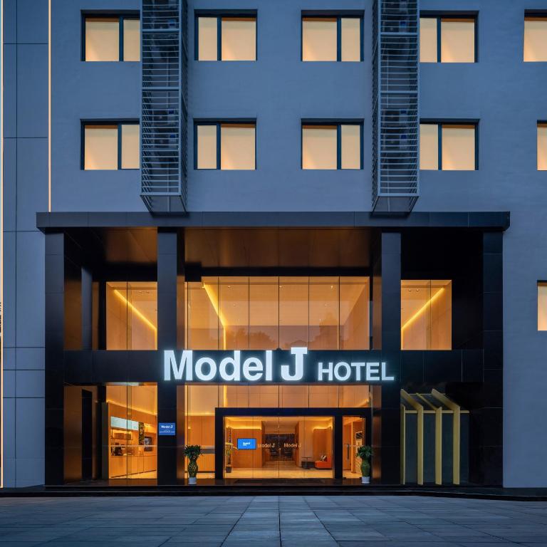 an exterior view of a modern j hotel at Model J Hotel Jakarta Central Park 曼居酒店 雅加达中央公园店 in Jakarta