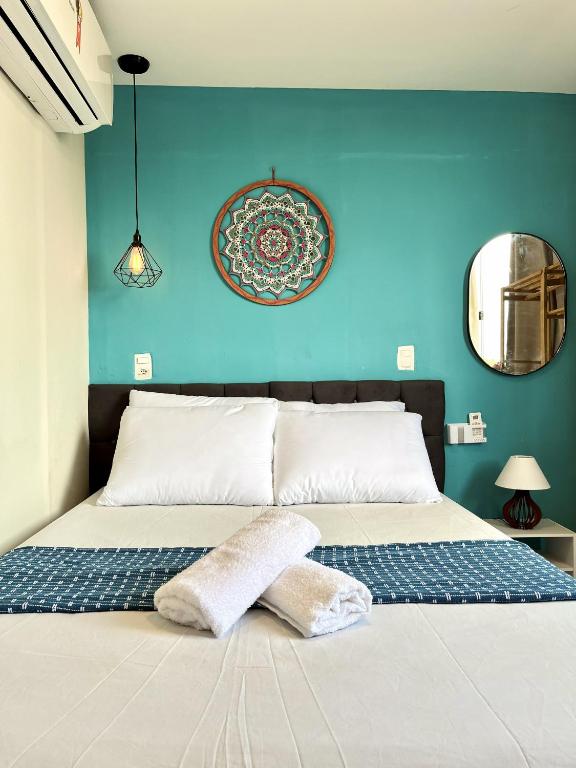 Ένα ή περισσότερα κρεβάτια σε δωμάτιο στο Alto da Pituba Flats