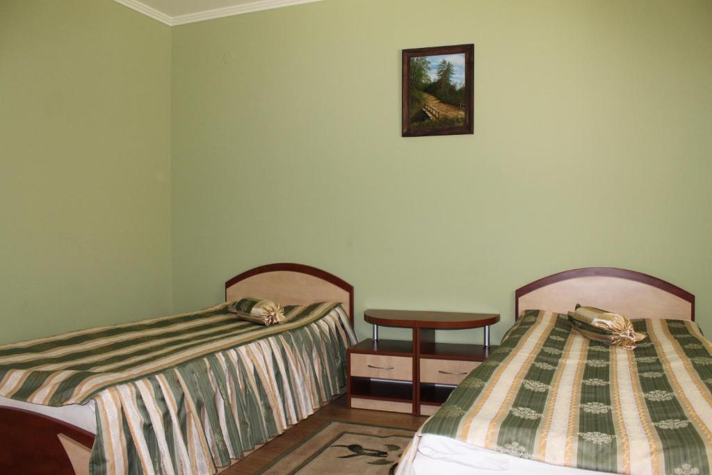 Postel nebo postele na pokoji v ubytování Passage Hotel