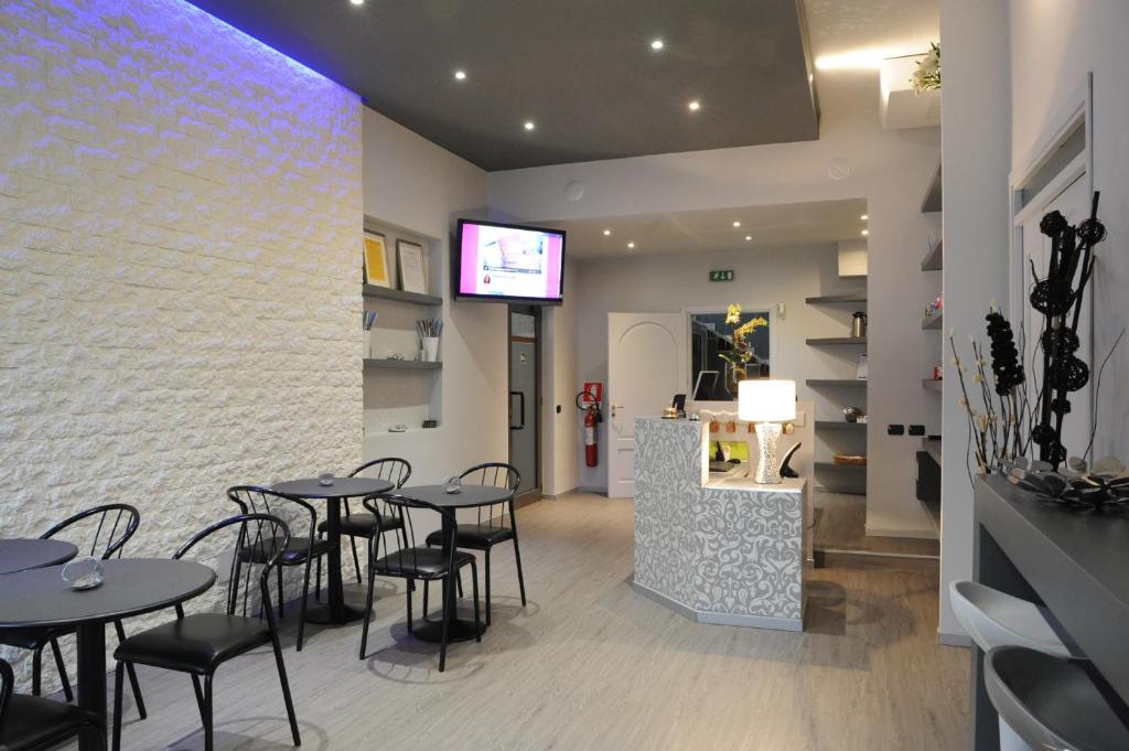 TV a/nebo společenská místnost v ubytování Hotel del Ponte