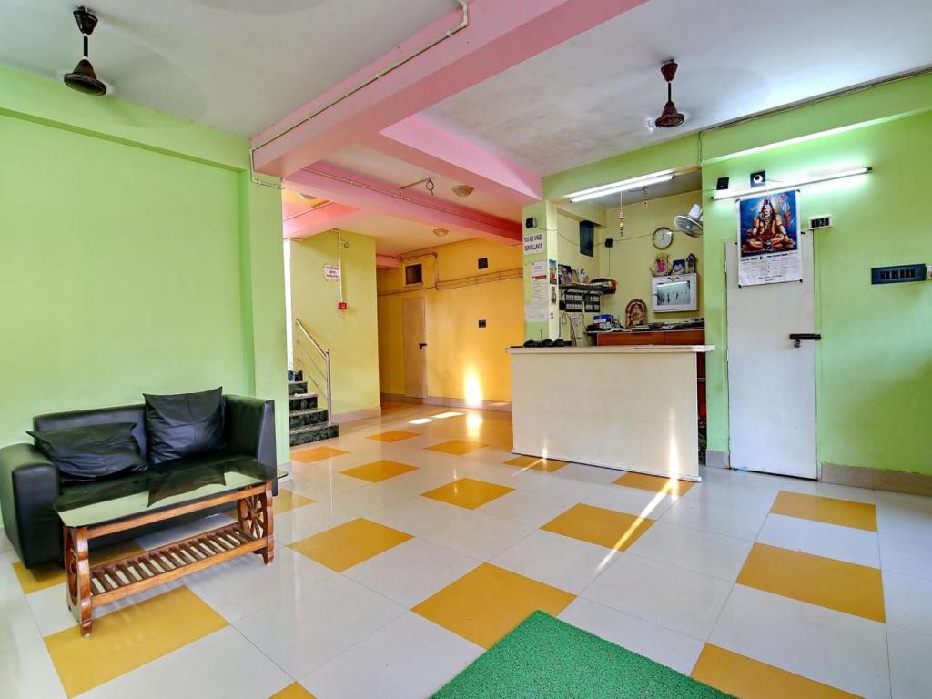 Kuchyň nebo kuchyňský kout v ubytování Hotel Cosy Inn