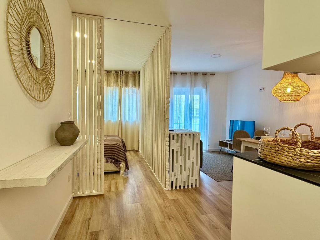 En eller flere senge i et værelse på Refúgio do Bairro no Centro Histórico Aveiro