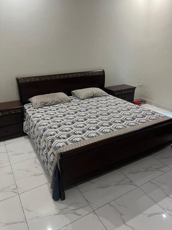 Postel nebo postele na pokoji v ubytování Shah House