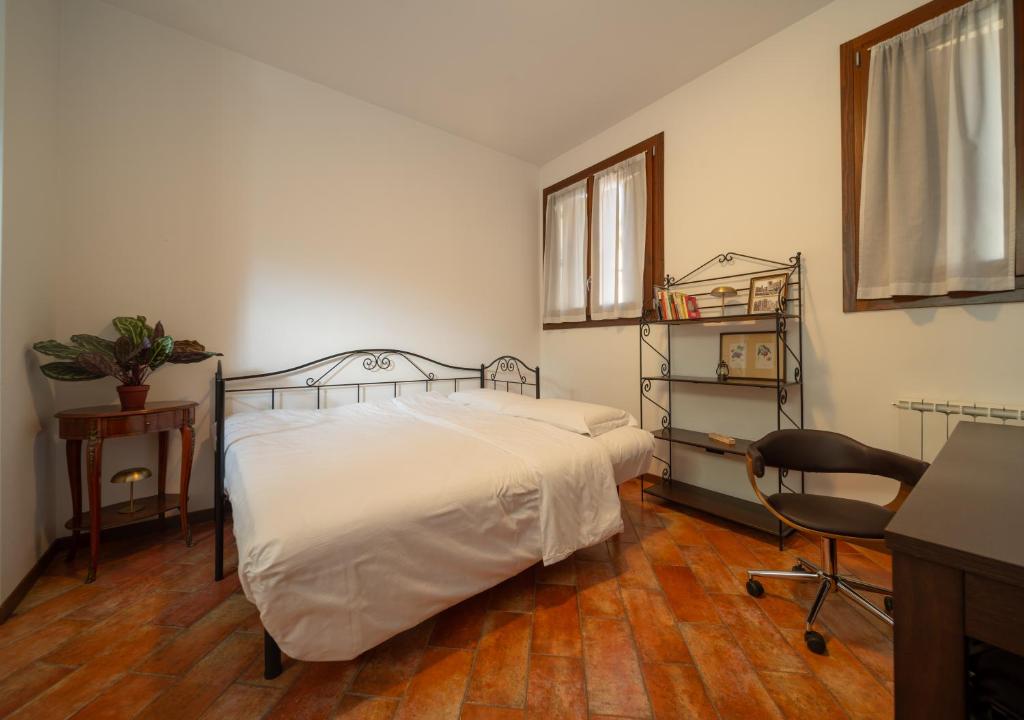 Ένα ή περισσότερα κρεβάτια σε δωμάτιο στο Mentana Flat, Centro Storico