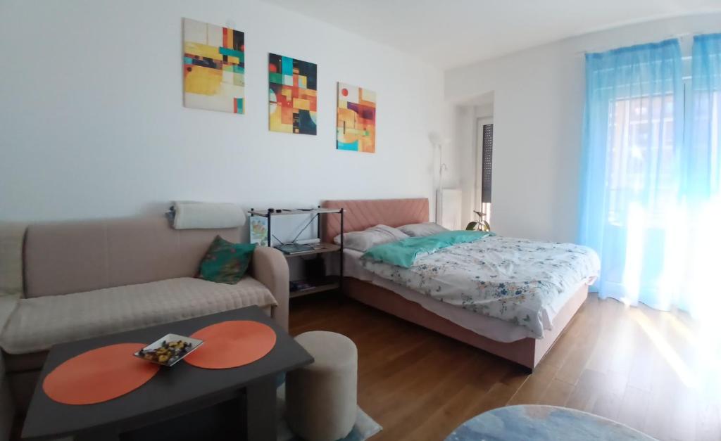 Ένα ή περισσότερα κρεβάτια σε δωμάτιο στο iwe