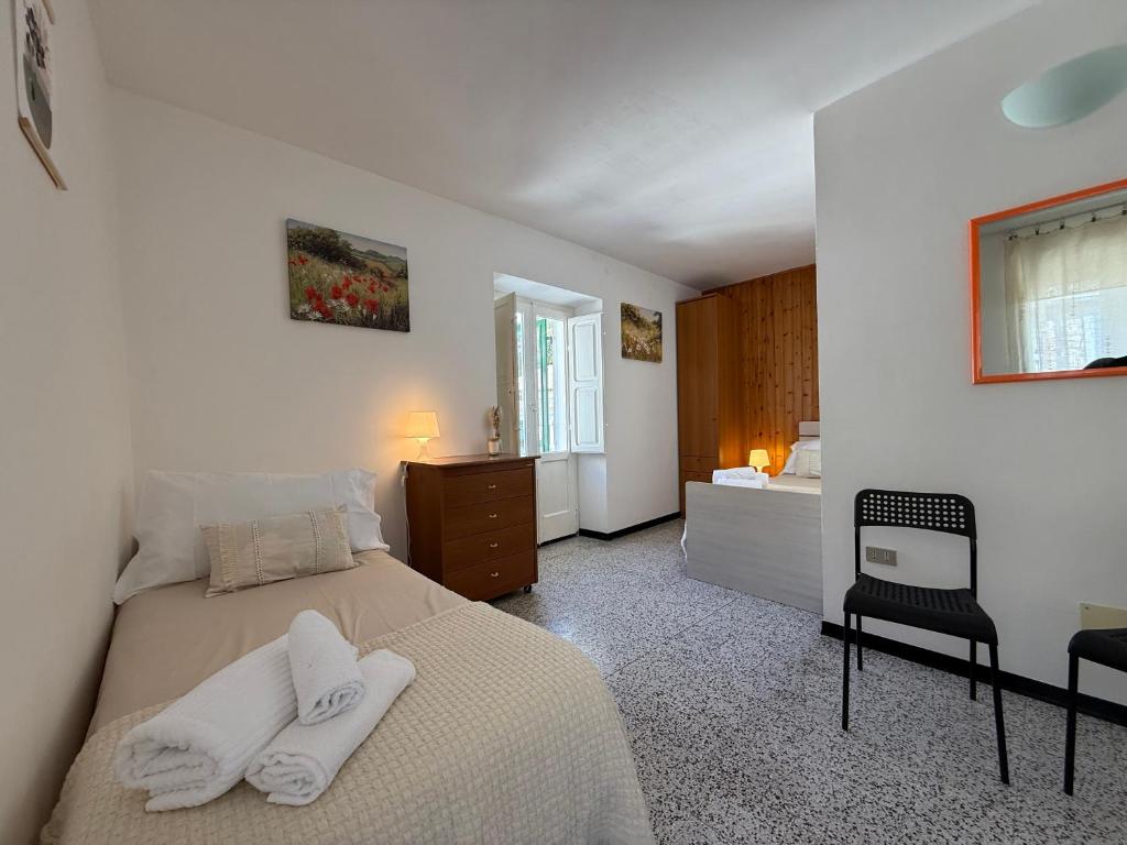 Ένα ή περισσότερα κρεβάτια σε δωμάτιο στο Casa vacanza Escher