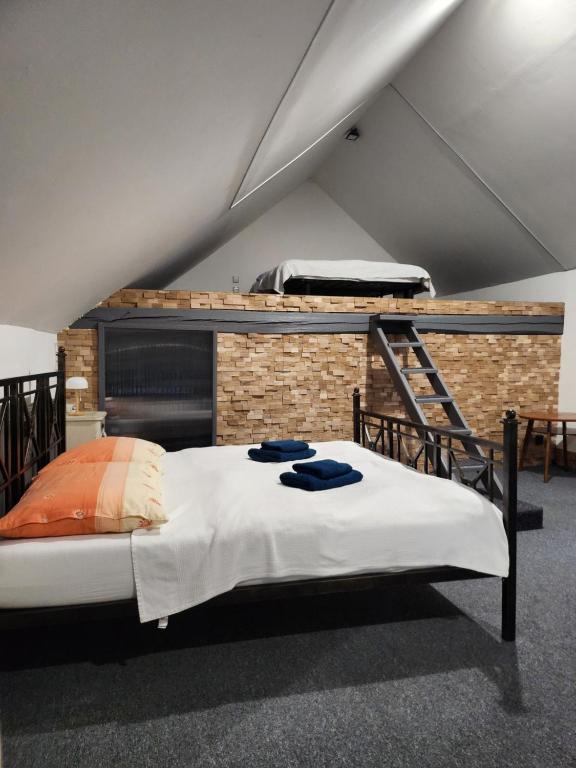 Ένα ή περισσότερα κρεβάτια σε δωμάτιο στο LOFT 70 m2