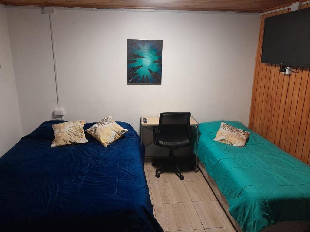 Postel nebo postele na pokoji v ubytování Departamento Jardin