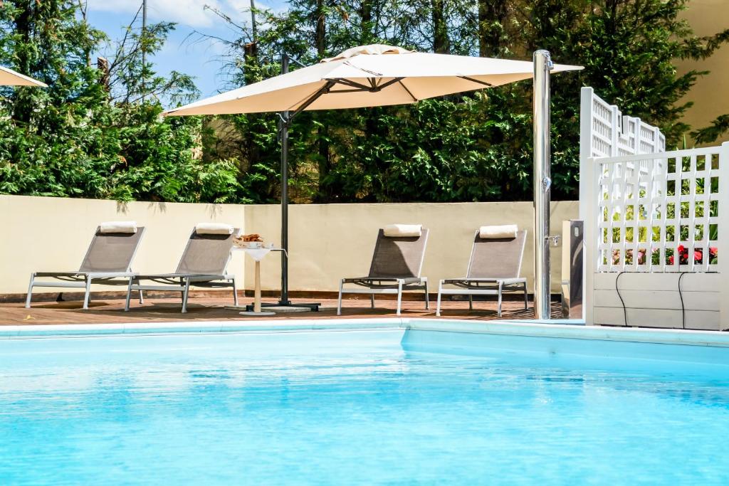 Bazén v ubytovaní Hotel Concorde alebo v jeho blízkosti