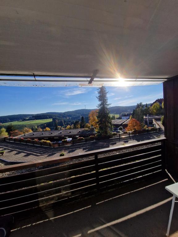a view of a train yard from a building at Foresty Appartement in Schonach